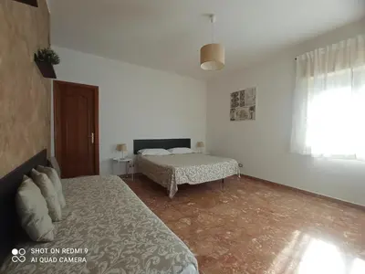 Letto o letti in una camera di Bed & Breakfast Fontanarossa Airport -Private Parking-