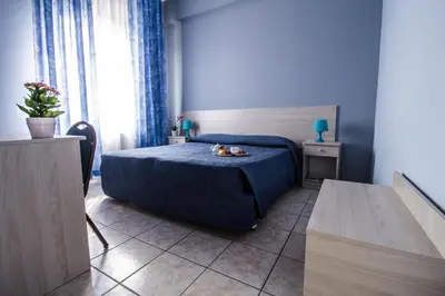 Letto o letti in una camera di Miramare Hotel