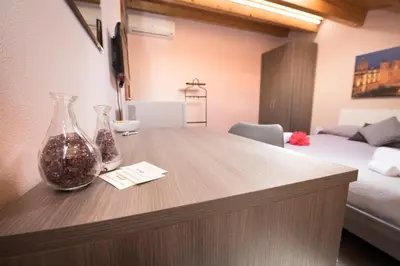 Letto o letti in una camera di Casa Malaclà B&B