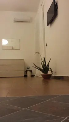 TV o dispositivi per l'intrattenimento presso Peri Peri Holiday Home - Siracusa