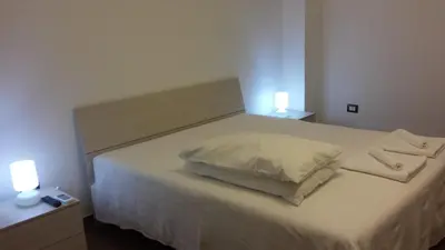 Letto o letti in una camera di Peri Peri Holiday Home - Siracusa