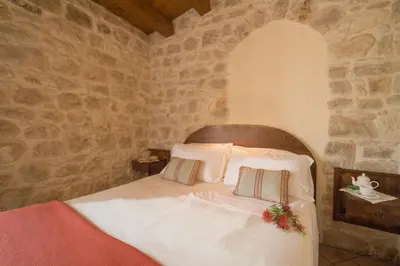 Letto o letti in una camera di Torre Don Virgilio Country Hotel