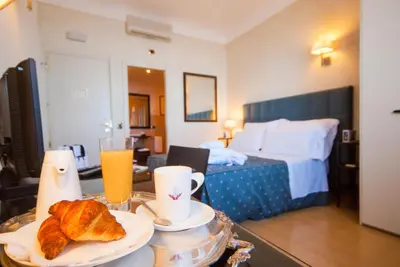 Letto o letti in una camera di Domus Mariae Benessere