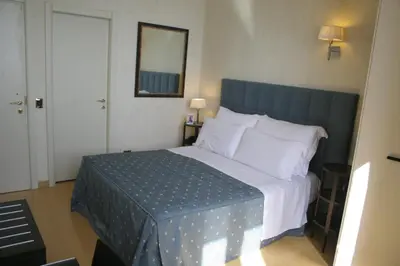Letto o letti in una camera di Domus Mariae Benessere