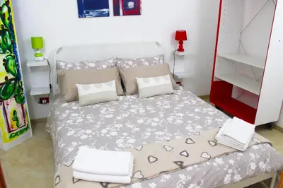 Letto o letti in una camera di Ariel Apartment Ortigia Siracusa