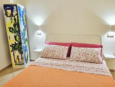 Letto o letti in una camera di Ariel Apartment Ortigia Siracusa