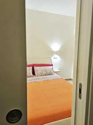 Letto o letti in una camera di Ariel Apartment Ortigia Siracusa