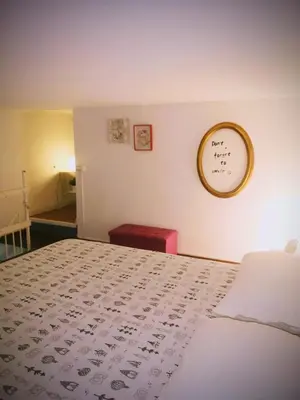 Letto o letti in una camera di Frida Guest House