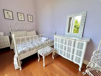 Letto o letti in una camera di La Casa di Aretusa