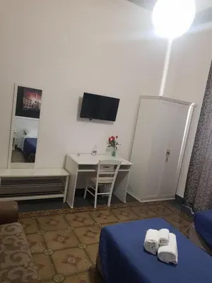 Letto o letti in una camera di B&B I Puritani