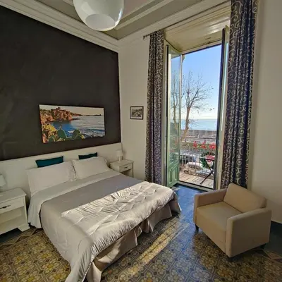 Letto o letti in una camera di B&B I Puritani
