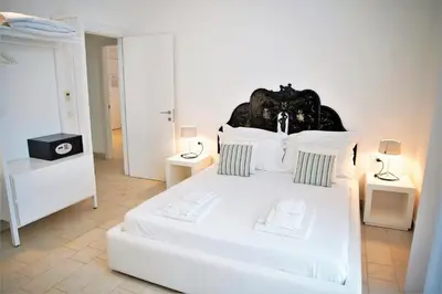 Letto o letti in una camera di Castello Tafuri