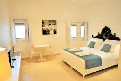 Letto o letti in una camera di Castello Tafuri