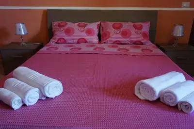 Letto o letti in una camera di Casa Vacanza il Ciliegio