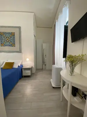 Letto o letti in una camera di Sole&Mare Ortigia