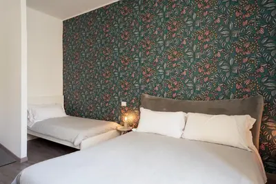 Letto o letti in una camera di Duomo & University Rooms Catania Center