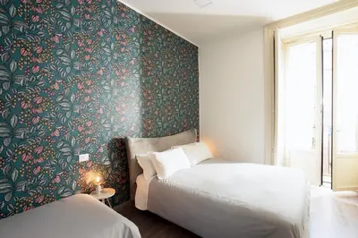 Letto o letti in una camera di Duomo & University Rooms Catania Center