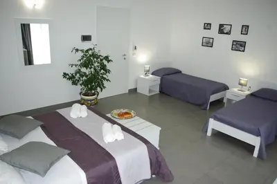 Letto o letti in una camera di Ermes