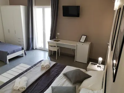 Letto o letti in una camera di Ermes