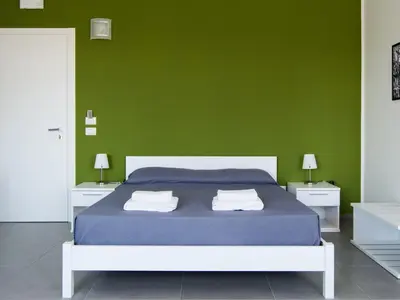 Letto o letti in una camera di Ermes