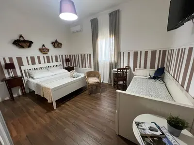 Letto o letti in una camera di Cozzo Spadaro B&B OnlyRooms