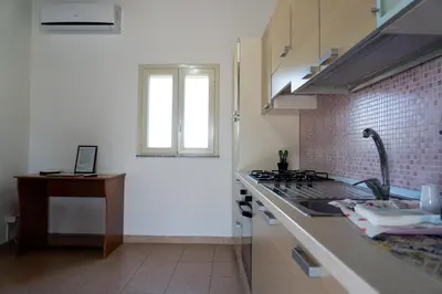 Cucina o angolo cottura di B&B L'Uliveto Rooms & Pool