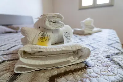 Letto o letti in una camera di B&B L'Uliveto Rooms & Pool