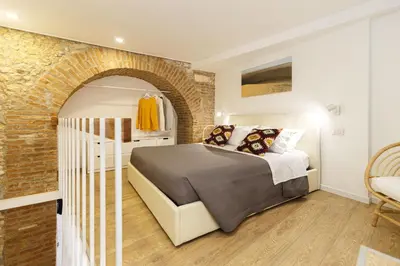 Letto o letti in una camera di Casa Marene Ortigia