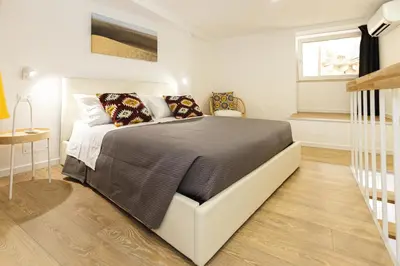 Letto o letti in una camera di Casa Marene Ortigia