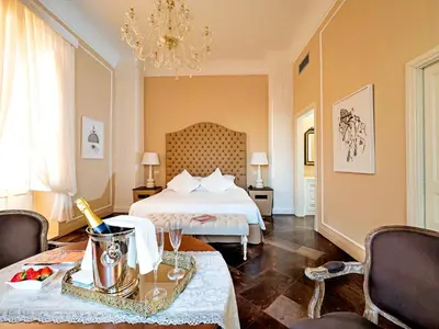 Letto o letti in una camera di Gagliardi Boutique Hotel