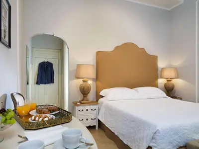 Letto o letti in una camera di Gagliardi Boutique Hotel