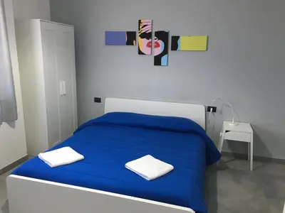 Letto o letti in una camera di Interno 10