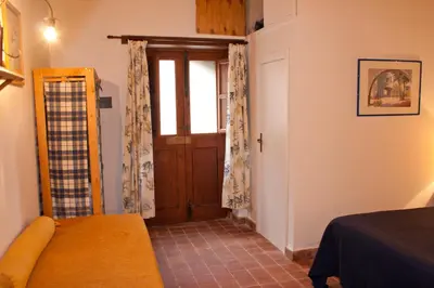 Letto o letti in una camera di Agosud Casa vacanze