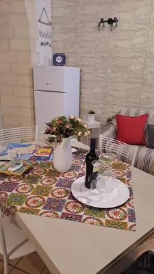 Cucina o angolo cottura di Appartamento Dammuso Isola Di Ortigia