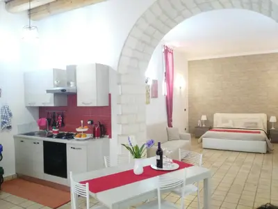 Cucina o angolo cottura di Appartamento Dammuso Isola Di Ortigia