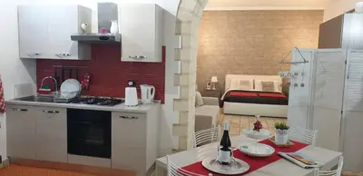 Cucina o angolo cottura di Appartamento Dammuso Isola Di Ortigia