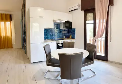 Cucina o angolo cottura di Noemi Holiday House
