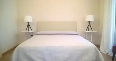 Letto o letti in una camera di B&B Casa D'alleri