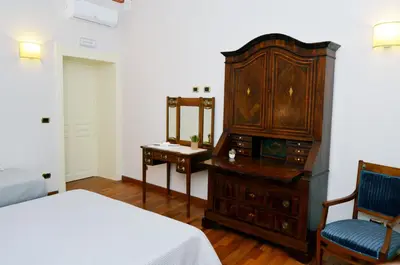 Letto o letti in una camera di B&B Casa D'alleri