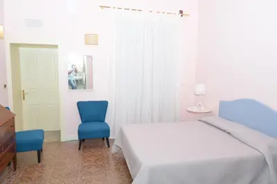 Letto o letti in una camera di B&B Casa D'alleri