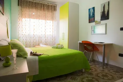 Letto o letti in una camera di B&B Giosy