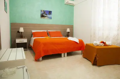 Letto o letti in una camera di B&B Giosy