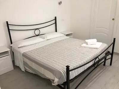 Letto o letti in una camera di Dione
