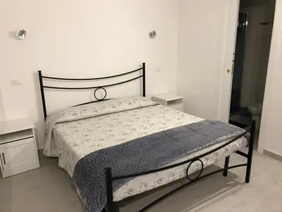 Letto o letti in una camera di Dione
