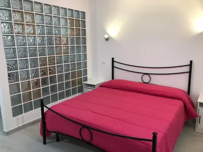 Letto o letti in una camera di Dione