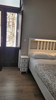 Letto o letti in una camera di Casa Bidduzza