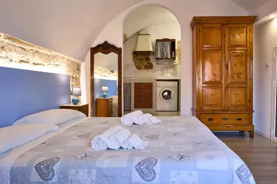 Letto o letti in una camera di Le Scale Sul Barocco