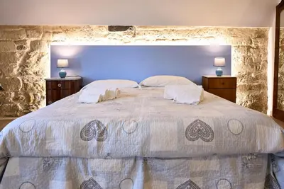 Letto o letti in una camera di Le Scale Sul Barocco