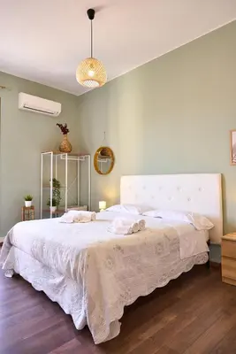 Letto o letti in una camera di Le Scale Sul Barocco