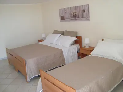 Letto o letti in una camera di Zagarella House